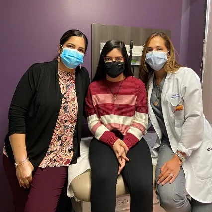 Dr. Hernandez with mom and patient