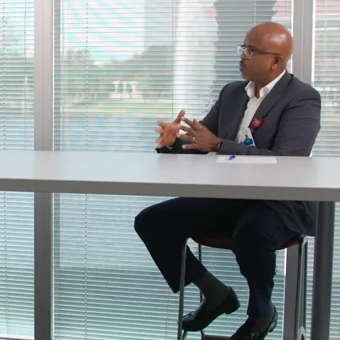 Dr. Hsu and Garrett Caldwell talking