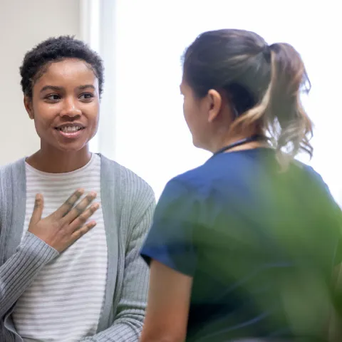 A female patient talking to her female doctor
