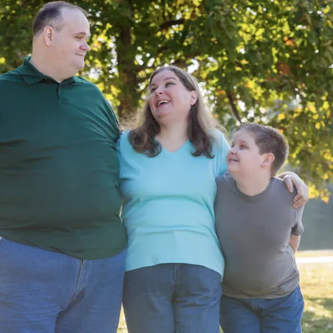 Family walking in the park.