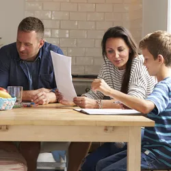 Family making New Year's Resolutions together