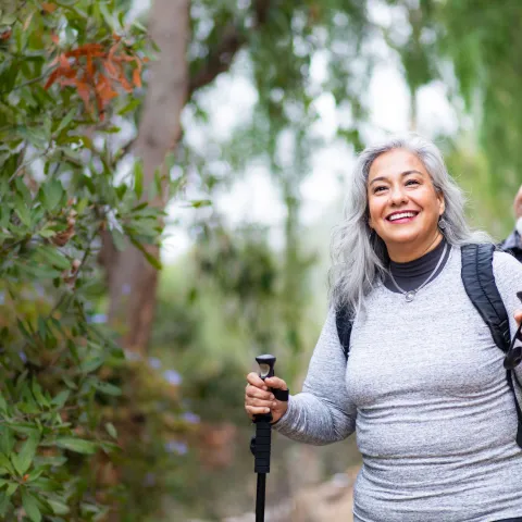 Active people walking in the woods