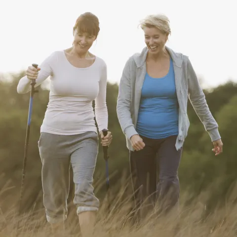 Happy women hiking together