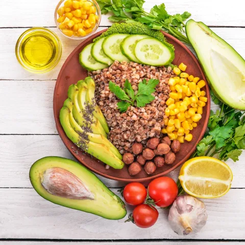 A plate filled with delcious and healthy foods.