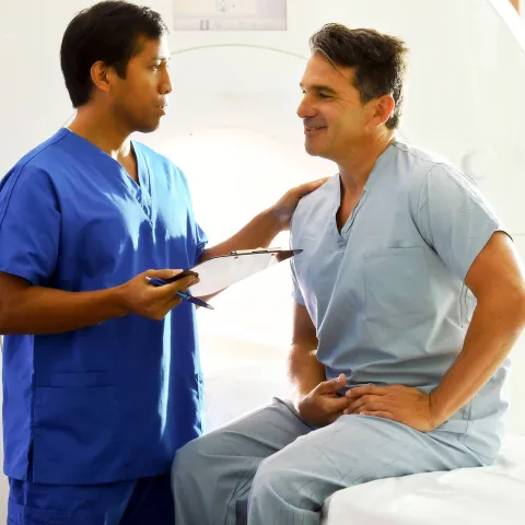 A man prepares for his MRI.
