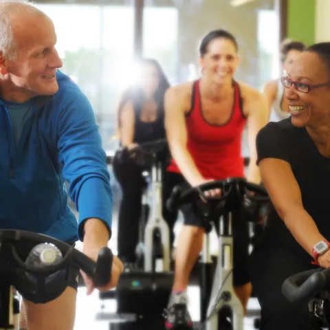 People in a cycling class.