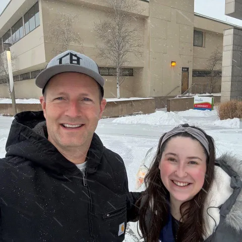 Two people out in the snow