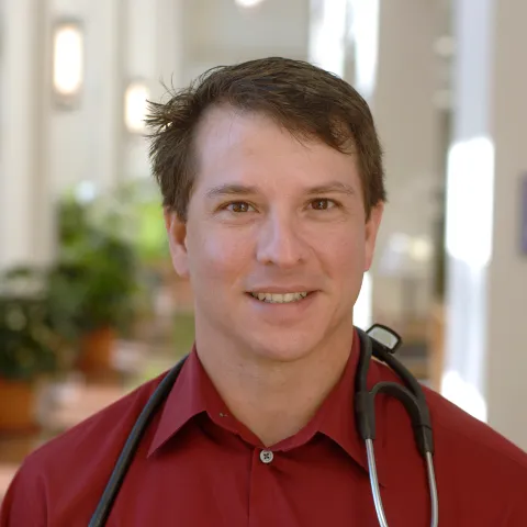 Headshot of James Scelfo.