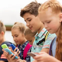 Kids using their phones.