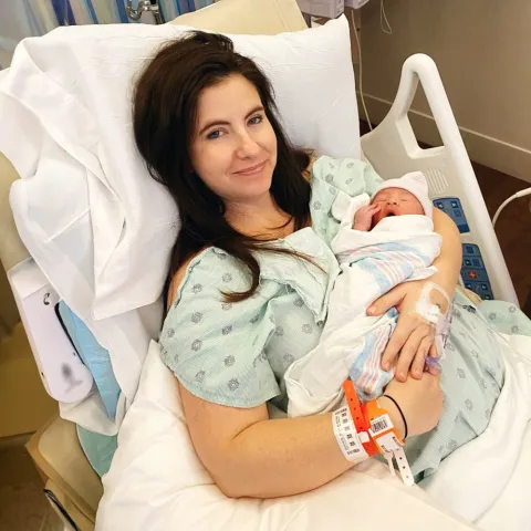 Brandy holding her newborn baby