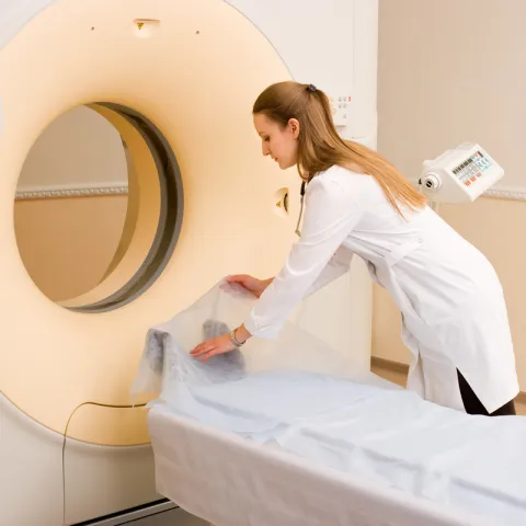 Physician preparing equipment