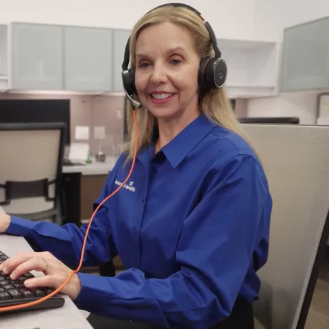 A Care Coordinator Helps a Patient on the Phone