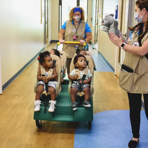 Two Caretakers with infants