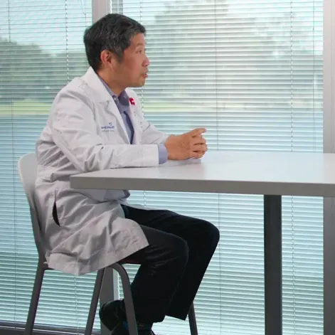 Dr. Hsu and Garrett Caldwell talking