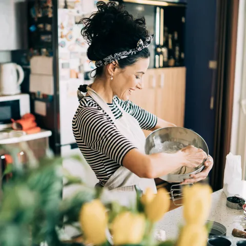 A woman cooking.
