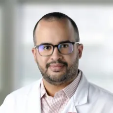 César A. Castillo-Alicea, MD