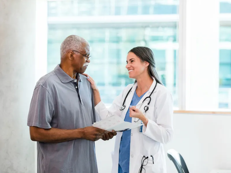 Doctor discussing information with patient