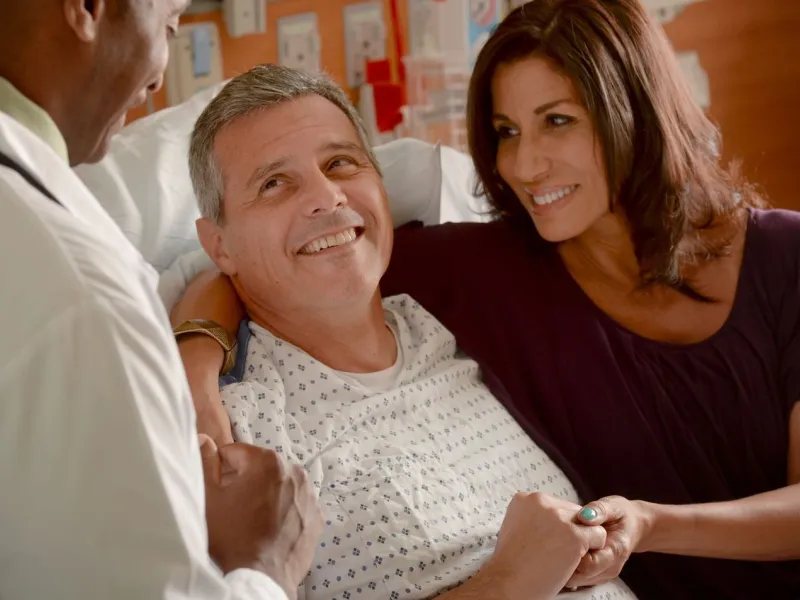 Patient with his wife in the hospital