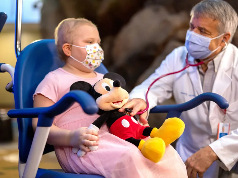 Dr. Keating with a Patient in the Lobby of AdventHealth for children