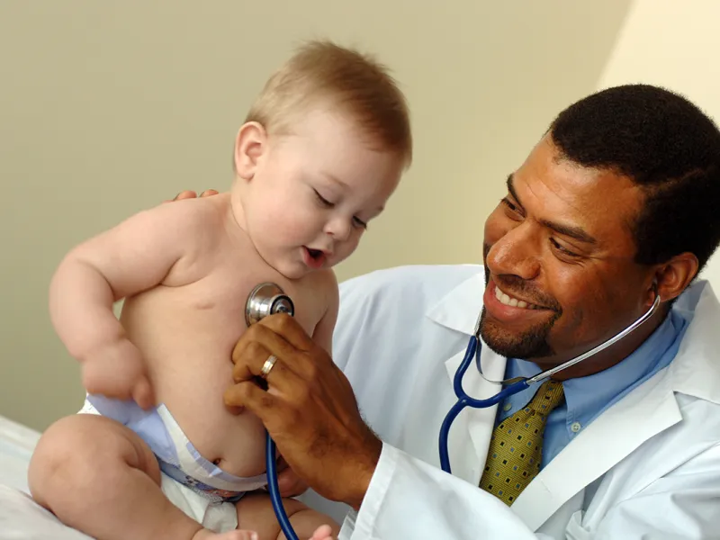 Doctor seeing Baby