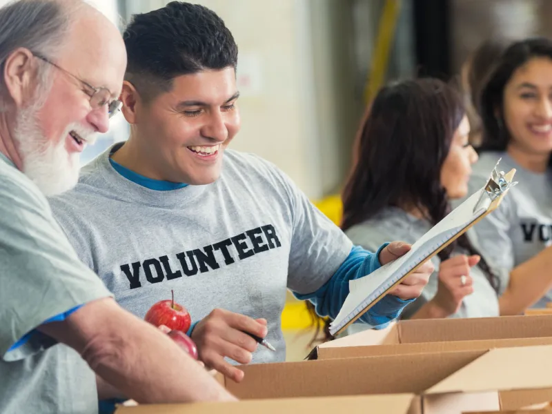 A group of volunteers organize donations. 