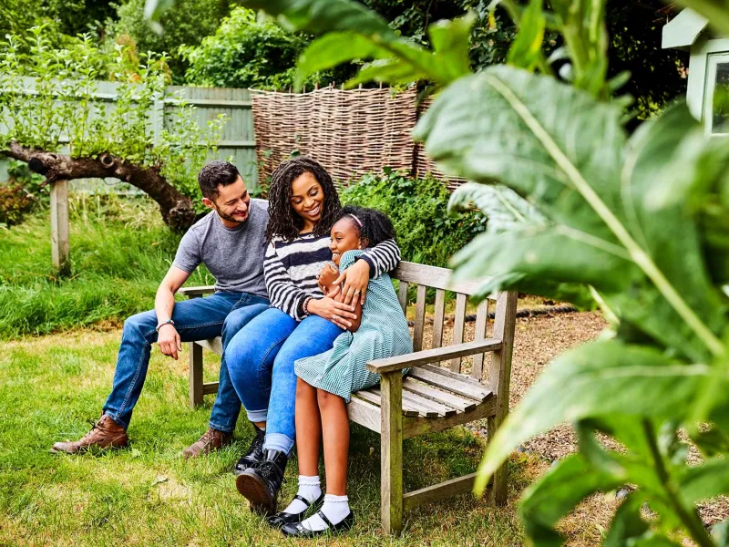 hero-family-relaxing-in-backyard-2000x1333