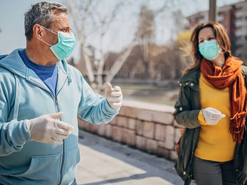 A man and woman taking a walk together.