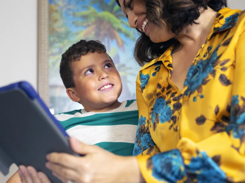 Mother and Son using a tablet.