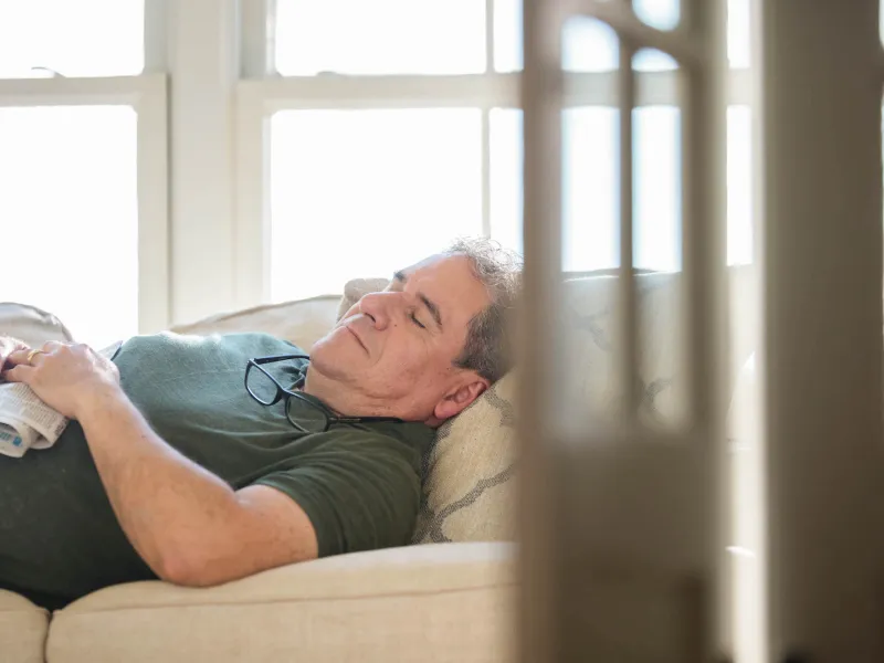 Grandpa is taking a nap.