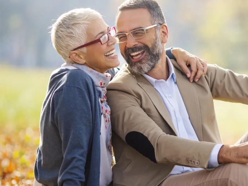 Happy, healthy couple in the park.