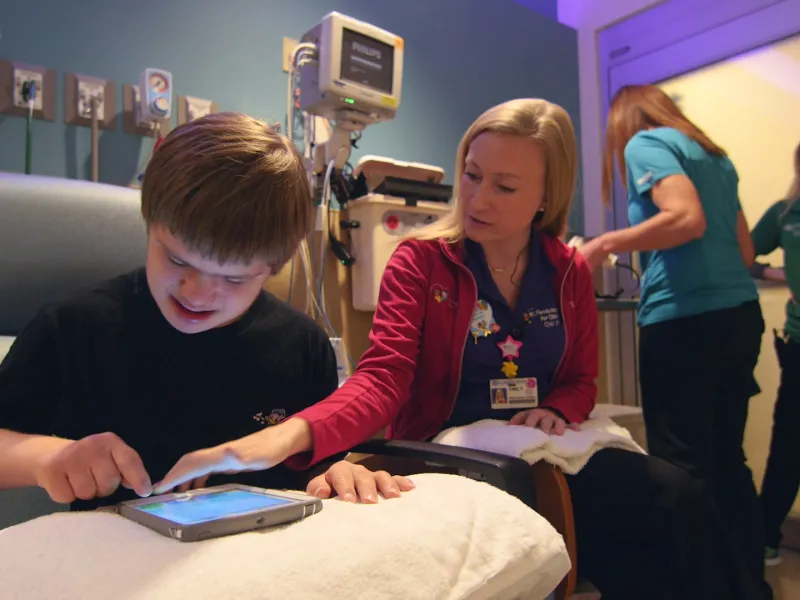 Patient Sean Sikora about to have his blood drawn.