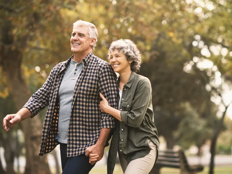 Couple walking in the park.