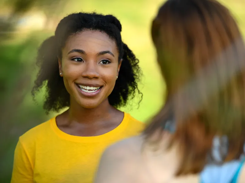 Women enjoying a nice conversation in the park.