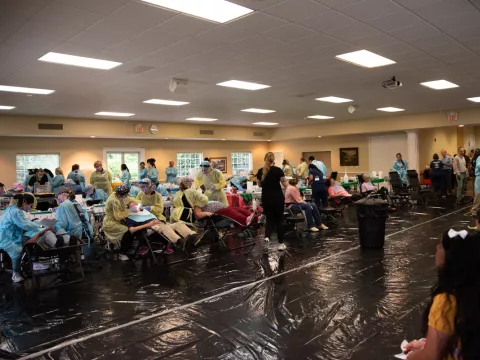 Gordon County residents lined up for hours to receive free dental cleanings and extractions at the AMEN Free Clinic on June 11.