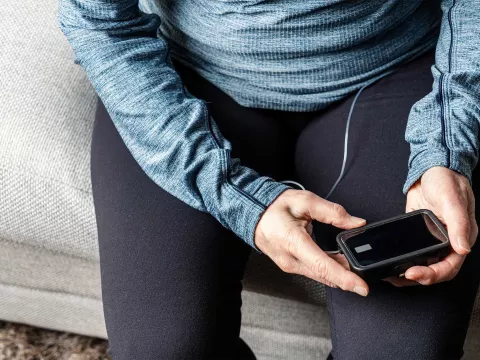 A man with a diabetes device