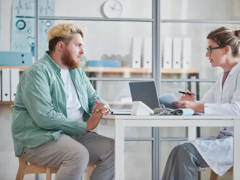 A Physician Speaks with a Concerned Patient about His Health