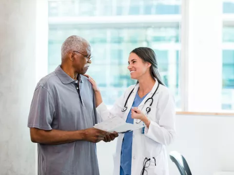 Doctor discussing information with patient