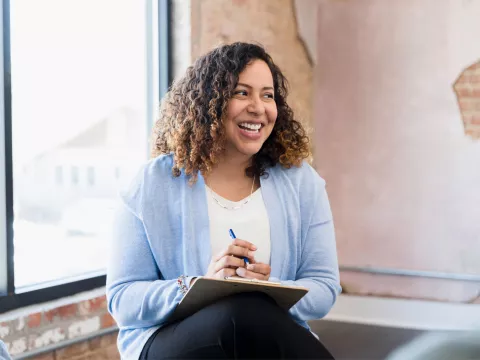 Woman taking notes about bariatric surgery