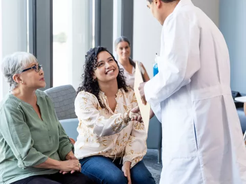 A Patient Shakes the Hand of a Physician in the Waiting Room