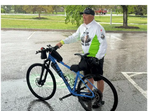 Mark Scotch being interviewed before riding to AdventHealth Porter.