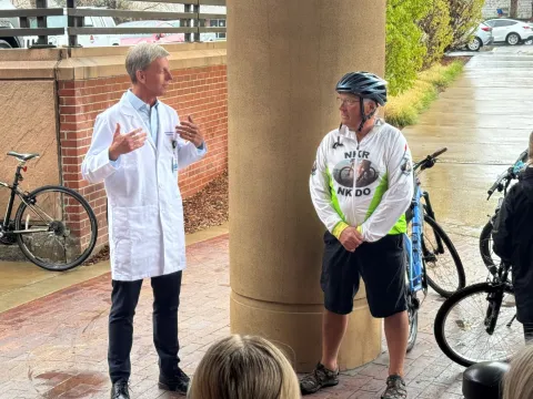 Mark Scotch talking with Dr. Alexander Wiseman.