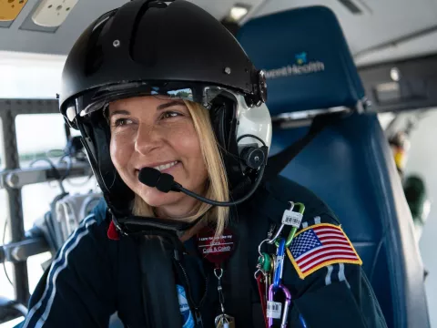 9.	Flight nurse Skye Vriesenga, RN, smiles at the end of another successful Flight 1 patient transport assignment.