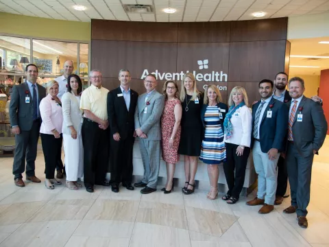 A group photo of people at an AdventHealth location.