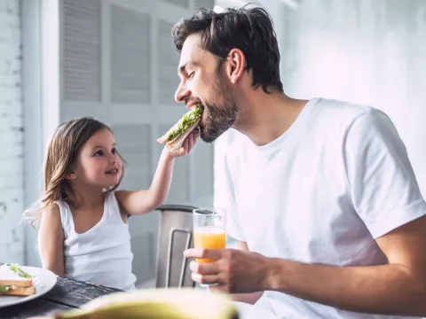 Father and Daughter Eating Healthy