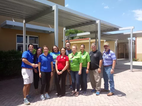 Volunteers helping to provide free sports physicals 