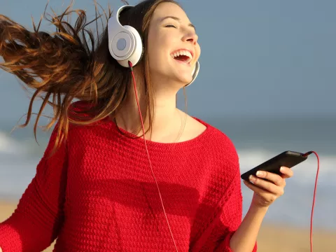 Woman Dancing on the Beach