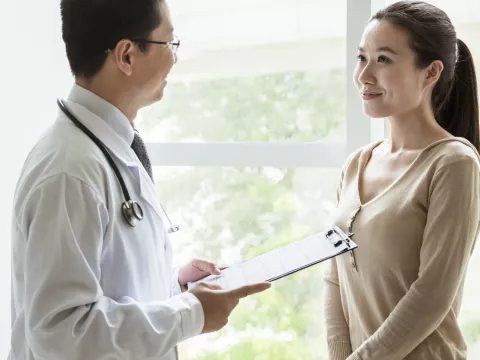 Woman getting a preventative screening