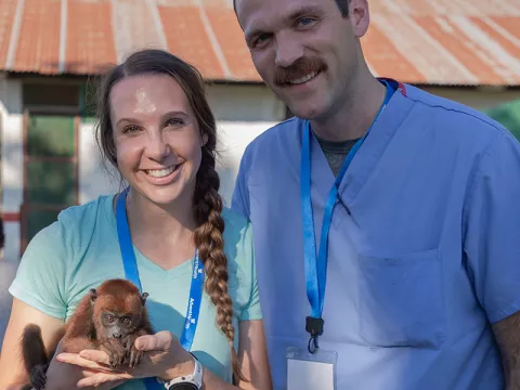 global-missions-peru-man-and-woman-with-monkey-800x800