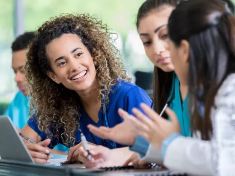 Young women with a computer.