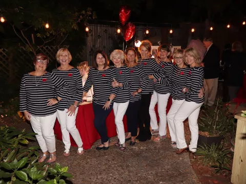 A group of women posing for a photo.
